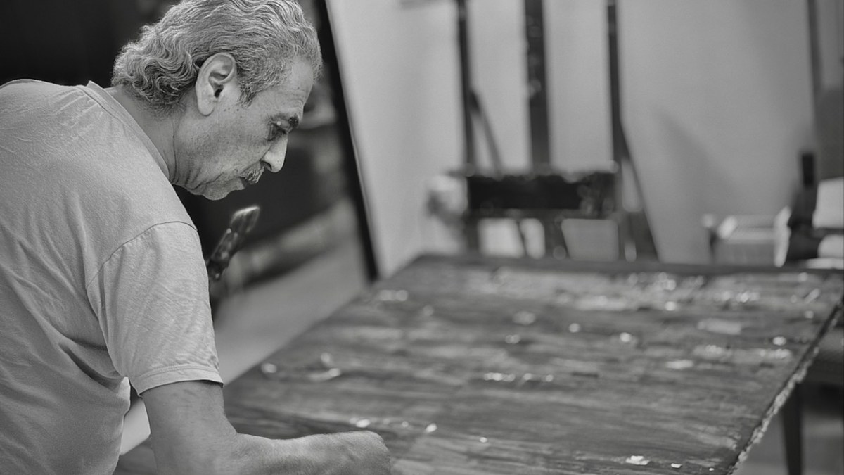 Syrian artist Abdul Hamid Al Fayad working in his studio.jpg — licensed editorial image
